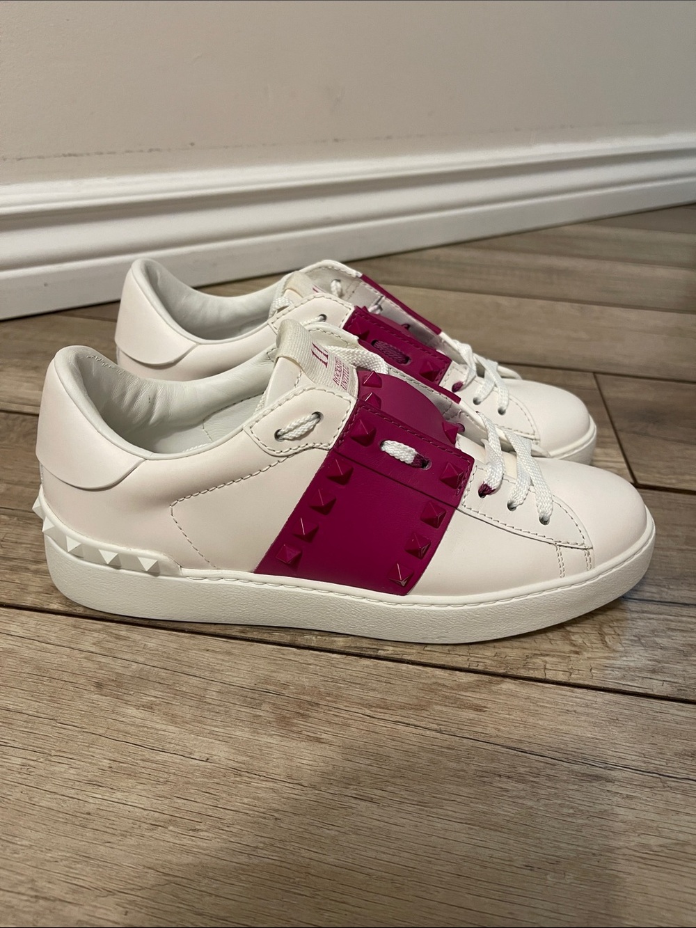 Valentino Garavani White Leather Rockstud Low-Top Sneakers with Pink Accents